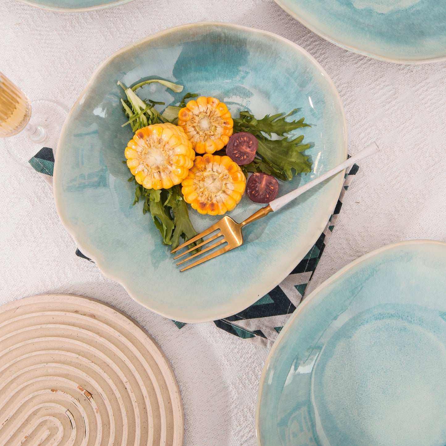 4-Piece Stoneware Deep Plate Set in Aqua Blue